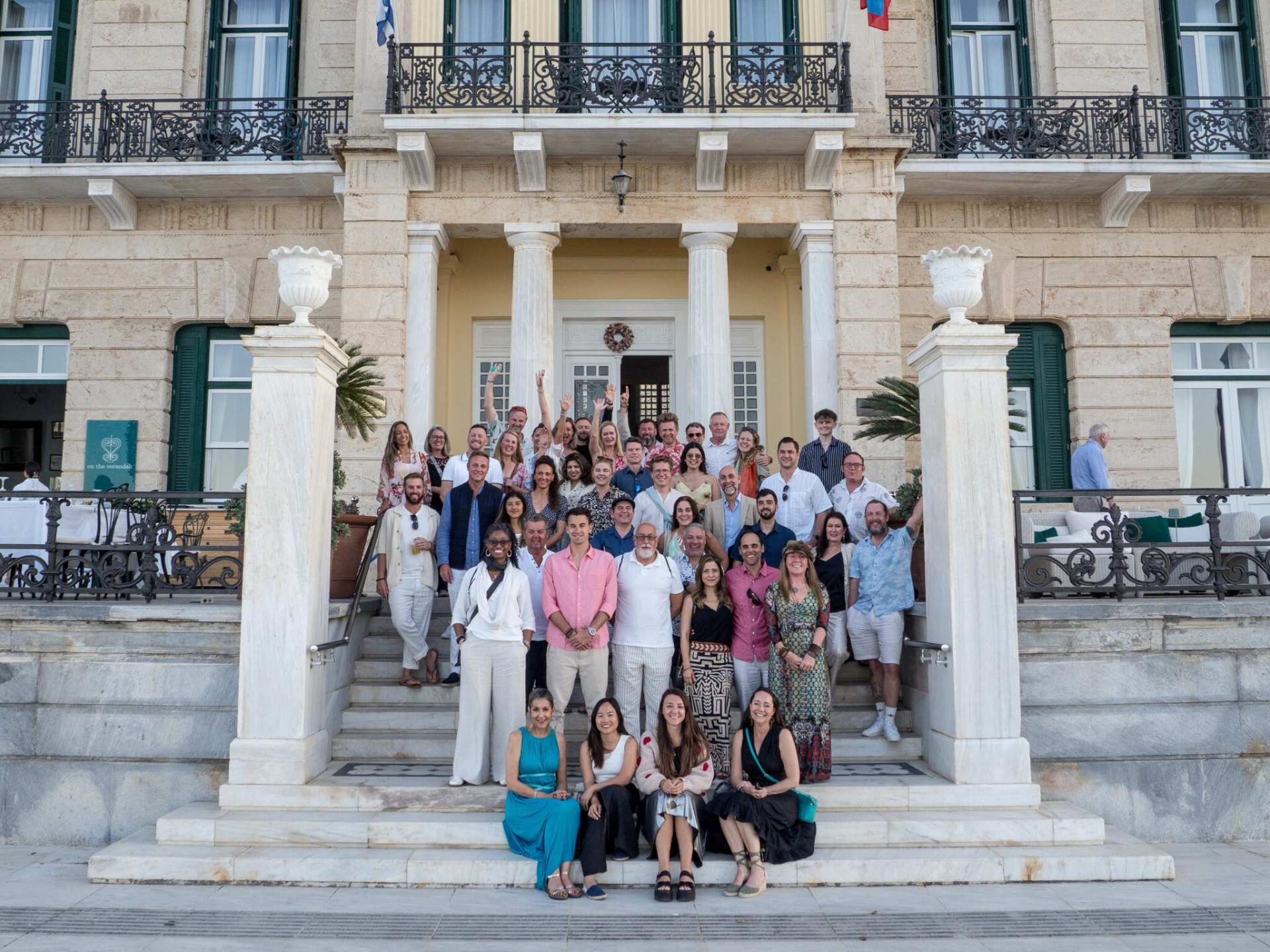 Eco Resort Network delegates gathered on the steps of the Poseidonion Grand Hotel, Spetses