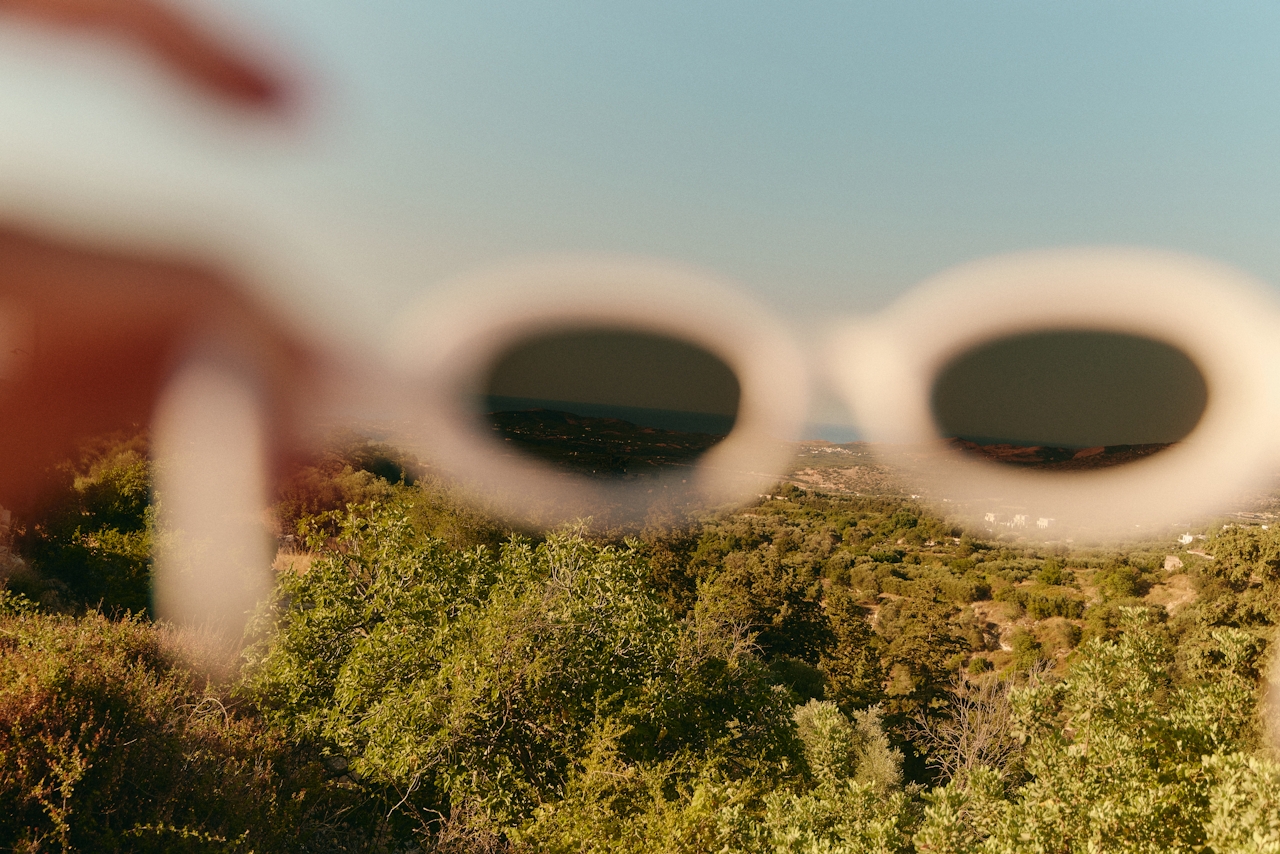 View through sunglasses across a mediterranean landscape